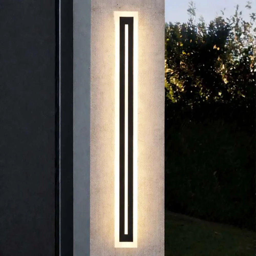 Applique murale extérieure moderne minimaliste LED noire sur béton texturé